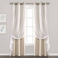 an open window with sheer curtains and white drapes