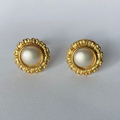 A beautiful set of Vintage Unsigned Faux Pearl and Gold Tone Clip On Earrings.  Classic & timeless design. The earrings are in very good vintage condition with sturdy clips.  Please, see pictures for sizing and additional details Not quite what you were looking for? Check out my other listings to find your perfect piece! We Sell A Unique Designer Costume Jewelry in Classic Style. Designer Costume Jewelry, Earrings Classic, Jupiter Fl, Round Flower, Black Rhinestone, Unique Designers, Gold Studs, Flower Shape, Timeless Classic