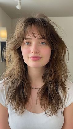 22 Flattering Hairstyles for Women with Big Foreheads Shag Haircut Long Hair With Bangs, Shag Haircut Women Long, Shag With Long Layers, Shag Haircut On Long Hair, Shag Haircut Long Wavy Hair, Haircuts For Wide Faces For Women, Wavy Hair Styles Long, Shag Haircuts Long Hair, Long Forehead Bangs