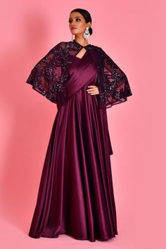 Wine draped saree gown with sweetheart neckline. Paired with sequin embroidered cape in floral pattern. - Aza Fashions Wedding Pre-draped Saree For Eid With Cape Sleeves, Semi-stitched Evening Dress With Sheer Dupatta, Draped Evening Dress With Sweep Train For Wedding, Wedding Evening Dress With Draped Sweep Train, Bollywood Style Gown With Cape Sleeves, Bollywood Style Dresses With Cape Sleeves For Eid, Festive Gown With Zari Work And Cape Sleeves, Festive Gown With Sheer Dupatta And Cape Sleeves, Satin Gown With Draped Sleeves