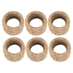 four pieces of jute rope with rings on each side and two holes in the middle