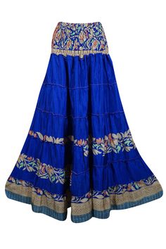 Embrace your free-spirited side with our Navy Blue Floral Boho Chic 2 in 1, Maxi Skirt Dress designed for the modern soul who loves to blend comfort and style. This flowing, maxi-length skirt features floral prints and earthy tones, perfect for creating a laid-back yet hippie-style look. Handcrafted with care, the skirt boasts tiered layers, ruched waist that can be pulled up as a strapless dress and subtle, giving it a graceful, gypsy flair. Whether you're strolling on the beach or attending a Ankle-length Maxi Skirt For Beach, Flowy Blue Skirt For The Beach, Ankle-length Maxi Skirt For Vacation, Blue Floor-length Maxi Dress For Festival, Blue Flowy Tiered Maxi Skirt, Bohemian Blue Maxi Skirt For Beach, Blue Bohemian Long Dress, Blue Flowy Tiered Maxi Dress, Blue Maxi Skirt For Vacation