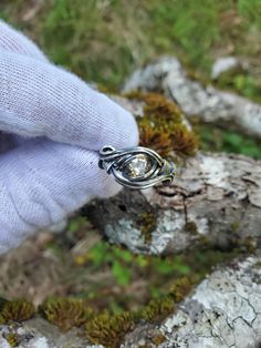 This ring features a 6.25mm faceted citrine that is hand wirewrapped in sterling silver. It has been oxidized and polished to give it a patina. Size 7.5 Hand Forged Sterling Silver Crystal Promise Ring, Unique Hand Forged Crystal Promise Ring, Hand Wrapped Sterling Silver Crystal Promise Ring, Hand-wrapped Sterling Silver Crystal Promise Ring, Hessonite Garnet, Amethyst Pendant, May 2024, Ring Size 7, Handmade Pendants