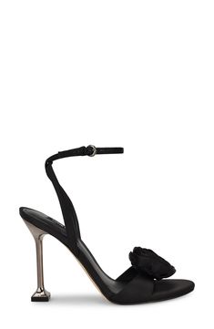 A voluminous rosette adds a dose of whimsy to an elegant sandal lifted by an architectural pin heel. 3 1/2" heel Adjustable ankle strap with buckle closure Textile upper/synthetic lining and sole Imported Elegant Sandals, Strap Sandals Women, Nordstrom Store, Sandal Women, Black Fits, Ankle Strap Sandals, Strap Sandals, Nine West, Ankle Strap