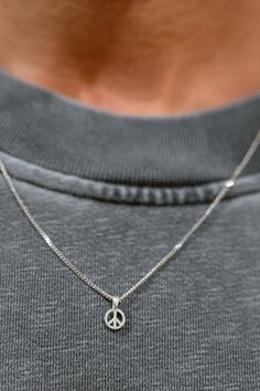 Our Peace Unisex Necklace - a symbol of blessings and a reminder of the gift of life. This pendant, designed for both men and women, carries a profound message: "Peace Necklace" symbolizes freedom and love. Our necklace features a small, delicate pendant that serves as a symbol of finding balance and embracing both the beauty and challenges of the world. It represents the idea that peace starts within us, with ourselves. Whether you're treating yourself or searching for a meaningful gift, this n Peace Necklace, Delicate Pendant, Unboxing Experience, Unisex Necklace, Finding Balance, Silver 925 Necklace, Special Person, Beautiful Packaging, Necklace Silver