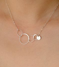 "Four eternal linked circles form the center of this beautiful necklace - four eternal circles, for four amazing decades. The perfect 40th birthday gift for her. [5 CIRCLE VERSION HERE: https://www.etsy.com/listing/674317239] Elegant. Simple. Available in silver, gold or rose gold. And you can add a disc to personalize the necklace, and I will hand stamp the initial for it. Your item comes in a cute gift box so you can give it as a gift - or enjoy opening it as a gift yourself! STEP 1: Choose th 40th Birthday Gifts For Women, Interlocking Circle Necklace, Cute Gift Boxes, 40th Birthday Gifts, Cat Necklace, Circle Necklace, Adjustable Necklace, Beautiful Necklace, 40th Birthday