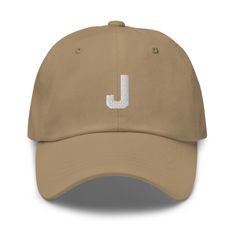 "This initial dad hat makes a perfect gift for your bridal party, bachelorette parties, or is a great 'treat yourself' gift!  * 100% chino cotton twill * Unstructured, 6-panel, low-profile * 6 embroidered eyelets * 3 ⅛\" (7.6 cm) crown * Adjustable strap with antique buckle * Head circumference: 20 ½″-21 ⅝″ (50.8 cm-53.3 cm)" Bachelorette Party Tote Bags, Monogramm Alphabet, Best Caps, Gifts For Hunters, Monogram Alphabet, Dad Cap, Camo Colors, Bachelorette Party Shirts, Dad Caps