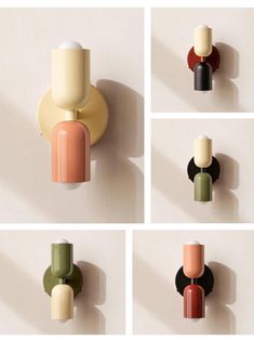 four different colors of vases on the wall, each with a single candle holder