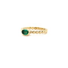 Our new beaded band ring is set with a beautiful oval 5x3 Emerald. The perfect sweet size to stack or wear every day. We set this stone in a sold gold bezel with an open bottom that allows the light to come in. There's a sizing bar at the bottom that allow us to make easy changes to the size without ruining the integrity of the beads. You'll love this new ring! 14K yellow gold 5x3 Oval Emerald Ring sizes 5-8 Beaded band design Gold Oval Stackable Birthstone Ring, Gold Oval Birthstone Stackable Ring, Dainty Oval Stackable Birthstone Ring, Oval Stackable Birthstone Ring In Fine Jewelry Style, Oval Birthstone Stackable Ring In Fine Jewelry Style, Yellow Gold Oval Birthstone Ring Stackable, Adjustable Stackable Oval Birthstone Ring, Yellow Gold Oval Stackable Rings, Classic Oval Stackable Emerald Ring