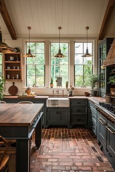 a kitchen with brick flooring and lots of counter space next to a stove top oven