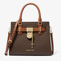 Hi This Is A Brand New Michael Kors Women's Handbag Called Hamilton In The Medium Size. This Bag Was A Gift But I Don't Use Large Satchel Bags So It Might Be Perfect For Your Collection. This Is Def A Statement Purse. Here's The Online Product Description: 35f1ghms2b-Brown (33 X 16 X 22 Cm) Material: Leather Locking Type: Magnet Scope Of Delivery: Including Brandedui Dimensions Approx.: 33 X 16 X 22 Cm Let Me Know If You Have Any Questions. It Will Be Delivered How It's Packaged In The Last Phot Shopping Tote Bag With Turn-lock Closure, Brown Coated Canvas Bag With Metal Hardware, Coated Canvas Crossbody Bag With Metal Hardware, Coated Canvas Satchel With Metal Hardware, Gold Travel Bag With Turn-lock Closure, Shopping Tote Shoulder Bag With Turn-lock Closure, Gold Satchel With Turn-lock Closure, Gold Satchel Bag With Turn-lock Closure, Luxury Shopping Bag With Turn-lock Closure