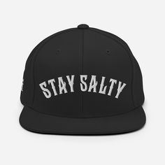 "️ Rock our 𝕿𝖍𝖊 𝕻𝖎𝖗𝖆𝖙𝖊 𝕮𝖆𝖗𝖙𝖊𝖑™ STAY SALTY Snapback Hat. 𝕻𝖗𝖔𝖉𝖚𝖈𝖙 𝕯𝖊𝖘𝖈𝖗𝖎𝖕𝖙𝖎𝖔𝖓: 𝖃 Design as pictured 𝖃 White Embroidery 𝖃 Flat Embroidery 𝖃 Classic Yupoong Snapback 𝖃 Premium wool blend. 𝖃 80% acrylic, 20% wool 𝖃 Green Camo is 60% cotton, 40% polyester 𝖃 Structured, 6-panel, high-profile fit 𝖃 6 embroidered eyelets 𝖃 Plastic snap closure 𝖃 Flat visor 𝖃 Green undervisor 𝖃 Head circumference: 21⅝″-23⅝″ (54.9 cm-60 cm) Thank you for your business and support! ️ 𝕿𝖍𝖊 𝕻𝖎𝖗𝖆𝖙𝖊 𝕮𝖆𝖗𝖙𝖊𝖑™ ️ \"𝖓𝖊 𝖕𝖔𝖚𝖗 𝖊𝖙𝖗𝖊 𝖑𝖎𝖇𝖗𝖊\" 𝕭𝖔𝖗𝖓 𝖙𝖔 𝖇𝖊 𝕱𝖗𝖊𝖊! ️ 𝕱𝖗𝖊𝖊𝖉𝖔𝖒 𝖃 𝕷𝖔𝖞𝖆𝖑𝖙𝖞 𝖃 𝕱𝖆𝖒𝖎𝖑𝖞 ️ 𝕱𝖎𝖓𝖉 𝖚𝖘 𝖔𝖓 𝖘𝖔𝖈𝖎𝖆𝖑 𝖒𝖊𝖉𝖎𝖆 - 𝕿𝖆𝖌 & 𝖀𝖘𝖊 @thepiratecartel #thepiratecartel Copyright © 2023 𝕿𝖍𝖊 𝕻𝖎𝖗𝖆𝖙𝖊 𝕮𝖆𝖗 Classic Snapback Hat With Letter Print And Curved Bill, Adjustable Snapback Hat With Letter Print And Flat Brim, Adjustable Flat Brim Snapback Hat With Letter Print, Classic Snapback Hat With Letter Print And Curved Brim, Adjustable Flat Brim Hat With Letter Print, Adjustable Hats With Letter Print For Streetwear, Snapback Fitted Hat With Letter Print, Adjustable Streetwear Hat With Letter Print, Fitted Snapback Hat With Letter Print