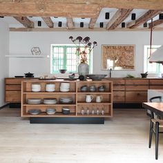 the kitchen is clean and ready to be used for dinner or desserts, as well as dishes