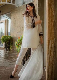 white silk short Pakistani kurti, festive indian wear, designer salwar suit, diwali indian dress, white silk straight pant, plus size indian formal salwar suit. ✨This beautiful embroidered silk dress.It has beautiful black resham thread embroidery. This dress comes with orgenza dupatta. ✨Dazzle with this indo western dress in any party or wedding function. ✨We stitched outfit with lot of care, so that our customers should not have any issues regarding finishing and fitting. ✨This dress can be cu Festive White Cambric Churidar, White Cambric Kurta For Wedding, White Cambric Dress For Eid, White Cambric Churidar With Dupatta, Elegant White Cambric Palazzo Set, White Cambric Dress With Dupatta, White Cambric Palazzo Set For Eid, White Cambric Salwar Kameez With Dabka Work, White Dabka Palazzo Set In Cambric