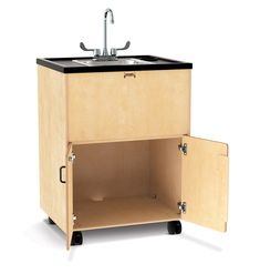 the sink cabinet is open and has a metal faucet