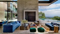 a living room filled with furniture and a fire place