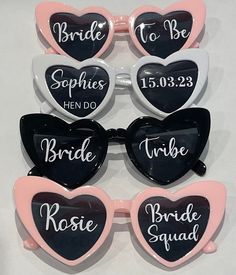 six heart shaped sunglasses with bride and groom names on the front, one for each