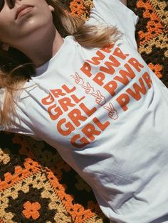 Girl Power Tee Orange Letter Print Tops For Streetwear, Casual Orange Tops With Graphic Design, Fun Graphic Design Tops, Cute Orange T-shirt With Graphic Print, Trendy Orange Tops With Text Print, Trendy Orange Top With Text Print, Orange Graphic Design Top For Summer, Orange Graphic Design Tops For Summer, Cute Orange T-shirt With Letter Print