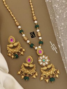 Description :- South Indian Jewellery Set /Temple Jewelry Set /Choker Necklace / Choker Set/ Bollywood Jewelry/ Indian Jewelry/ Gifts Perfect for Indian weddings. All the raw material used in this product is of high quality and is handcrafted with love. Premium Quality and High craftsmanship 100% Satisfaction Guarantee: Long Lasting Plating, High-Quality Stones. Gifting: This pair of charming necklace and earrings come in a beautiful gift box, making it an ideal gift for birthday, wedding annive Luxury Brass Temple Jewelry Necklace, Cheap Gold Temple Jewelry Sets, Luxury Elegant Temple Necklace For Festivals, Luxury Handmade Temple Jewelry Sets, Cheap Temple Jewelry Sets For Festive Occasion, Luxury Temple Jewelry Necklaces For Festivals, Luxury Temple Necklace Pendant For Festivals, Luxury Gold Temple Necklace For Rituals, Luxury Temple Jewelry With Matching Earrings