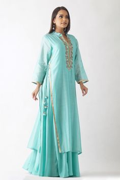 Bollywood Style Embroidered Dress With Mirror Work, Designer Anarkali Dress With Mirror Work, Designer Bollywood Embroidered Saree Dress, Bollywood Style Designer Embroidered Saree Dress, Bollywood Style Festive Embroidered Dress With Mirror Work, Designer Embroidered Saree With Zari Work, Wedding Chanderi Kaftan With Mirror Work, Traditional Embroidered Dress With Mirror Work For Designer Wear, Festive Eid Embroidered Dress With Cutdana