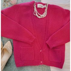 Rare New With Plastic Tag With Extra Buttons And Thread, Never Worn, Right From The Department Store In The 1980s! Cropped Deep V Cardigan Sweater Fuchsia Pink Sweater Shoulder Pads Retro. Size Is Small But It Is Slightly Oversized Could Fit Small Or Medium. Very Soft, Button Front. Approx. Measurements Laying Flat Armpit To Armpit 20" Length: 22" 49% Mohair 51% Acrylic Classic Pink V-neck Cardigan, Classic Pink Winter Cardigan, Classic Pink Sweater For Fall, Vintage Pink Winter Cardigan, Pink Vintage Winter Cardigan, Fuchsia Pink, Shoulder Sweater, Pink Sweater, Department Store