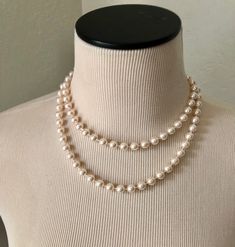 Vintage single strand of pearls is 36 inches in length.. ... but is versatile and can easily be worn as a double strand as seen in the pictures. The pearls are a creamy white hue. The clasp is a shepherd's hook style. Great classic piece of costume jewelry. The pearls are in lovely vintage condition! Vintage Royal Jewelry, Classic Long Necklace For Formal Occasions, 50s Necklace, White Pearls Necklace, 60s Jewelry, Alien Halloween, Vintage Pearl Necklace, Pearl Rope, Classic Pearl Necklace