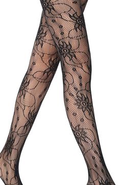 Spruce up your style with these dreamy fishnet tights brimming with lively floral detailing. Polyamide/elastane Hand wash, line dry Imported Fitted Mesh Summer Tights, Summer Fishnet Fitted Hosiery, Fitted Fishnet Hosiery For Summer, Fitted Summer Fishnet Hosiery, Spring Lace Stretch Tights, Spring Party Mesh Tights, Sheer Lace Stretch Tights, Summer Thigh High Mesh Tights, Summer Thigh-high Mesh Tights