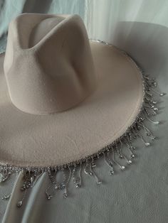 GET TO KNOW THE PRODUCT Color: Cream Wide brim Rhinestone fringe Adjustable band inside One size Rhinestone Cowboy Hat, Rhinestone Cowboy, Rhinestone Fringe, Cowboy Hat, Wide Brimmed, Shoe Sale, Skirt Pants, Dress Pants, Cowboy Hats