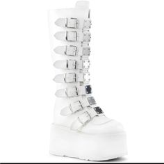 Brand New White Leather Demonia Damned Boots. Brand New In Original Packaging! 3 1/2" (90mm) Platform Knee High Boot 8 Buckle Straps Metal Plates At Center Back Metal Zip Closure Approximate Calf Circumference: 13.7" Approximate Shaft Height: 14" Demonia Damned 318, Botas Goth, Demonia Boots, Alternative Shoes, Demonia Shoes, Festival Shoes, Punk Boots, Metal Plates, Gogo Boots