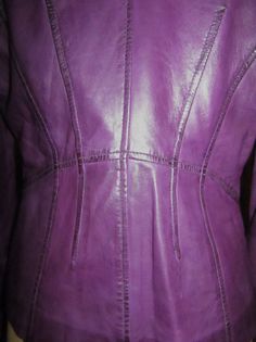 "Scully leather women's jacket is a lovely soft velvet feel mint purple jacket. Perfectly styled to add a Springtime vibe to any wardrobe. Super soft glove feel leather that is just dreamy to feel. This lovely jacket has a semi-fitted bodice that has a darted front for added simple style and to showcase your lovely figure. Twin pockets adorn the front on each side and then have an added zipper to boot for extra security for smaller items and for a little style. This has a very nice satin purple Soft Gloves, Purple Jacket, Frye Boots, Purple Leather, Leather Jackets Women, Soft Velvet, Fitted Bodice, Simple Style, Black Boots