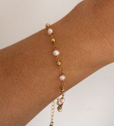 Gold Plated and Freshwater Pearl Beaded Chain Bracelet Real Freshwater Pearls Length: approx. 6 - 8 inches (adjustable) 18 Gold Electroplated This bracelet is made with a real freshwater pearls, therefore each pearl is unique and no two bracelet are alike. Adjustable Pearl Bracelet With Charm And Round Beads, Adjustable Pearl Beaded Bracelets With Pearl Drop, Dainty Adjustable Beaded Bracelets With Pearl Chain, Adjustable Dainty Pearl Drop Bracelet, Dainty Adjustable Bracelet With Pearl Drop, Dainty Adjustable Pearl Drop Bracelet, Adjustable Pearl Bracelet With Pearl Drop And Round Beads, Adjustable Pearl Bracelet With Pearl Drop, Adjustable Pearl Drop Bracelet