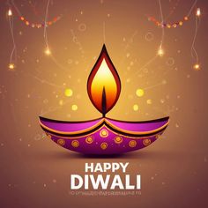 a happy diwali greeting card with a lit candle