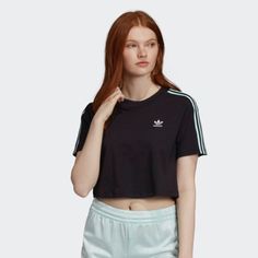 Classic Sports Style Gets A Fresh Update. This T-Shirt Shows Off Iconic 3-Stripes On The Sleeves. The Cropped Length Gives It A Modern Shape That's Feminine And Flattering. The Tee Is Made Of Smooth All-Cotton Jersey That Has A Soft Feel. Casual Fitted T-shirt With Three Stripes, Fitted Casual T-shirt With Three Stripes, Adidas Crew Neck T-shirt With Contrast Stripes, Adidas Contrast Stripes Crew Neck T-shirt, Adidas Logo Summer Top, Summer Adidas Logo Top, Adidas Sporty Top With Three Stripes, Adidas Sporty Tops With Contrast Stripes, Athleisure Short Sleeve Top With Side Stripes