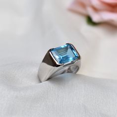 D E T A I L S - Stone: Natural Swiss Blue Topaz Stone Size: 10x12mm Material: 925 Sterling Silver The Fit: True to US ring size Finish: Silver & Smooth S H I P P I N G & P R O D U C T I O N - My current production time is 2-6 business days, which means after those days are up, your order ships! I make everything custom to order, by hand, but I promise you it's worth the wait! R U S H - M Y - O R D E R - If you're in a rush to get your pretty new pieces, please send me a message and I'll Male Proposal Ring, Formal Blue Topaz Signet Ring, Gift Blue Topaz Ring With Polished Finish, Blue Topaz Ring With Polished Finish, White Gold Polished Blue Topaz Ring, White Gold Blue Topaz Ring With Polished Finish, Polished Blue Topaz Ring, Blue Topaz Open Ring For Anniversary, Blue Topaz Rings With Polished Finish For Anniversary