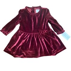 This Velvet Dress And Bloomers Set Is Designed For Special Occasions. Made With High-Quality Materials And Featuring A Lovely Bow Detail, It Ensures Both Style And Comfort For Your Baby. Velvet Dress With Bow Detail Includes Matching Bloomers Designed For Special Occasions Made From Polyester And Elastane Long Sleeves For Added Warmth Button Closure At Back Size: 9m 27-28.5 In / 17-21 Lb Size: 9m Condition: New With Tags Baby Velvet Dress, Bow Detail, Dress With Bow, Velvet Dress, Kids' Dresses, Special Occasion, Velvet, Formal Dresses, Tags