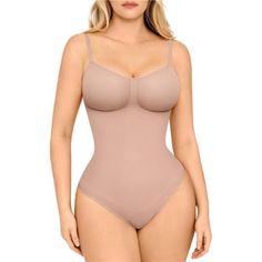 Waist-Slimming Body Shaper Boasts A 360 Seamless Design, Meticulously Crafted From A Blend Of 77% Nylon And 23% Elastane Fabrics. It's Exceptionally Smooth, Soft, And Stretchable, Providing A Lightweight, Skin-Friendly, And Breathable Experience. Ideal For Year-Round Wear, This Seamless Bodysuit Shapewear Ensures All-Day Comfort, Gently Hugging Your Curves While Remaining Virtually Undetectable. Stay Comfortably Tucked In Without Sacrificing Freedom Of Movement. Shapewear Offers Moderate Compres Beige Seamless Push-up Shapewear, Fitted Beige Smoothing Shapewear, Fitted Beige Shapewear, Shaping Beige Bodysuit With Medium Bust Support, Summer Shaping Bodysuit In Beige, Summer Shaping Beige Bodysuit, Beige Shaping Bodysuit For Summer, Sleeveless Beige Smoothing Shapewear, Beige Sleeveless Smoothing Shapewear