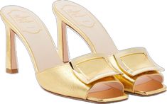 Luxury Sandals With Sculpted Heel And Square Toe, Gold Open Toe Calf Leather Heels, Gold Leather Mules For Spring, Luxury Mules With Buckle Closure For Spring, Luxury Spring Mules With Buckle Closure, Chic Gold Calf Leather Sandals, Gold Open Toe Heels In Calf Leather, Chic Gold Sandals In Calf Leather, Gold Calf Leather Open Toe Heels