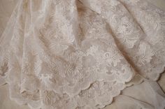 ivory lace fabric, embroidered tulle lace fabric, embroidered mesh lace fabric Cream Lace Fabric With Embroidered Lace Patchwork, Cream Tulle Fabric With Lace Trim, Cream Lace Tulle Fabric With Lace Trim, Cream Tulle Fabric With Crochet Lace, Cream Tulle Fabric With Crochet Lace Detail, Elegant Beige Lace Tulle Fabric, Cream Tulle Lace Fabric With Lace Work, Cream Crochet Lace Tulle Fabric, Floral Lace Fabric