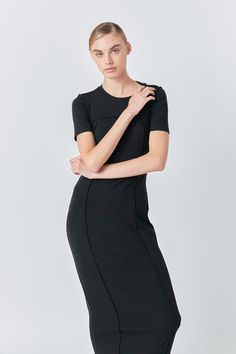 Introducing our stunning Overlock Piping Knit Maxi Dress - the perfect addition to your wardrobe! This dress features a maxi length open back design and short sleeves for a comfortable and stylish look. Its rib neck band adds a unique touch making it stand out from traditional maxi dresses. Made with high-quality fabric and expertly crafted overlock piping this dress provides both comfort and style. Perfect for any occasion whether it's a casual day out or a special event. Upgrade your dress col Fitted Short Sleeve Maxi Dress For Work, Sleek Short Sleeve Midi Dress For Summer, Black Maxi Dress With Side Slits For Work, Stretch Midi Dress With Flattering Silhouette And Short Sleeves, Stretch Midi Dress With Short Sleeves And Flattering Silhouette, Black Short Sleeve Maxi Dress With Side Slits, Short Sleeve Bodycon Maxi Dress For Evening, Black Maxi Dress With Side Slits And Short Sleeves, Bodycon Maxi Dress With Short Sleeves For Evening