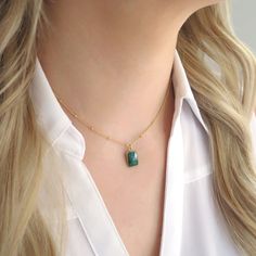 "I fell in LOVE with this stone the moment I had it! This sweet little emerald necklace is the perfect gift for a May birthday, someone with a green alma matter, or an emerald lover! It's hung on a satellite chain for a little extra texture - a beautiful conversation starter. Shop Landon Lacey Jewelry » www.etsy.com/shop/landonlacey it's in the DETAILS . . . » Gold filled or sterling silver satellite chain » Genuine raw emerald quartz gemstone, polished and faceted » The model is petite and is w Delicate May Birthstone Necklaces For Her, Dainty May Birthstone Charm Necklace As Gift, Green Emerald Pendant Necklace As A Gift For Her, Green Emerald Pendant Necklace For Her, Dainty Emerald Gemstone Necklace For Everyday, Emerald Necklace With Delicate Chain For Gift, Emerald Necklace With Delicate Chain As Gift, Everyday Delicate Necklaces With May Birthstone, Dainty Everyday Emerald Gemstone Necklace