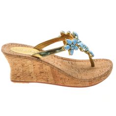 This sandal features a 3 inch Cork wedge. Hand-Made & Made to Order (2-4 Weeks) Fits True To Size- If you already own our shoes, stick with the same size Leather Sole and Leather Upper Lined with Suede For Added Comfort Embellished with Czech Crystals & Rhinestone Chain Cork Wedge 3 Wedge Heights Available: 1.5 Inches, 2.5 Inches, 3 Inches Use Our “Change A Wedge” Button To Select The Wedge Height Of Your Choice Customized Orders are Final Sale Made in Bali, Shipped From Los Angeles Turquoise Wedge Heel Sandals For Beach, Wedge Mules, Rhinestone Chain, Toe Rings, Wedge Sandal, Cork Wedge, Crystal Rhinestone, Wedge Sandals, Heeled Mules