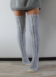 READY TO SHIP Hand knit wool socks Cable knit thigh high socks Handmade over knee socks These knitted socks are the perfect cold-weather accessory! Whether going out or staying in, keep warm and fashionable. These socks are not only warm, but they are cute and cozy! Wear them slouchy, knee-high, or stretched over the knee. Whatever way you choose, these socks are sure to make you look and feel fabulous! Use them as bed thigh high socks to keep your feet warm on cold nights at home. Gray socks le Cozy Comfortable Knee-high Socks For Stocking Stuffers, Winter Knitted Socks For Stocking Stuffers, Cozy Knee-high Winter Stockings, Cozy Knee-high Socks For Stocking Stuffers, Knee-high Socks For Winter Stocking Stuffer, Comfortable Cozy Knee-high Socks, Cozy Comfortable Knee-high Socks, Cozy Cable Knit Leg Warmers For Stocking Stuffers, Knit Socks For Winter And Stocking Stuffers