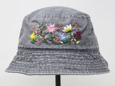 Item: mushroom embroidered bucket hat Material: 100% cotton Size: one size fits most Embroidery: hand made with acrylic thread Free first class shipping, upgradable priority mail service. 30 days return policy, feel confident at your purchase! Summer Cotton Hat With Embroidered Patch, Custom Embroidered Cotton Summer Hats, Custom Embroidered Cotton Hats For Summer, Custom Embroidered Summer Hats With Adjustable Fit, Casual Summer Hats With Custom Embroidery, Embroidered Bucket Hat For Spring, Embroidered Adjustable Bucket Hat, Adjustable Embroidered Bucket Hat, Spring Embroidered Bucket Hat