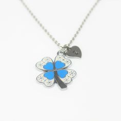 ♥ Flower Enamel Necklace Silver Flower Enamel Charm Necklace Flower Gift Flower Charms Valentine Gift Personalized Necklace Initial Necklace ♥ This is a beautiful flower charm with hand stamped initial charm on a stainless steel chain, You able to choose initial from a drop down menu, ♥ You will receive 1 necklace ♥ Flower Charm 28x34 x2 mm ♥ Initial charm 10 mm choose from a drop down menu ♥ Stainless steel chain 18 inches ♥ Shipping Fee : One shipping fee for all items paid in one transaction/ Silver Necklaces With Flower Charm For Good Luck, Silver Necklace With Flower Charm For Good Luck, Nickel-free Flower Charm Necklace, Silver Hypoallergenic Flower Necklace, Flower Pendant Necklace With Lobster Clasp As Gift, Flower Necklace With Lobster Clasp As Gift, Peach Necklace, Personalised Bangle, Flower Charm Necklace