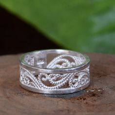 About item Item :- Ring Ring size :- Chose from variation (Custom size accepted) Material  :- 925 Sterling silver Purity  :- 92.5 Title:-Filigree Band Ring, Sterling Silver, Art Nouveau Ring, Openwork Lace, Promise Ring, Bridesmaid Gift, Stackable Ring, Midi Ring, Boho Jewelry Description:- We use 925 sterling silver to making jewelry. We accept all types of custom & personalized order. Please send us a message if you are interested in a custom creation. Shipping profile:- We ship all order with Bohemian Rings With Intricate Design For Anniversary, Bohemian Rings With Intricate Design For Promise, Engraved Adjustable Ring With Decorative Band As Gift, Bohemian Flower Ring With Intricate Design For Gift, Bohemian Wedding Jewelry With Artistic Design, Bohemian Sterling Silver Filigree Ring For Wedding, Handmade Filigree Toe Ring For Wedding, Bohemian Silver Stackable Rings For Wedding, Silver Rings With Unique Design For Weddings