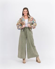 Introducing the Janine Cropped Jacket, a versatile floral print jacket that is both stylish and effortless. With its easy-to-throw-on design, this jacket is the perfect addition to any outfit. Whether dressing up or down, the Janine Cropped Jacket will add a touch of chic to your look. Material: 30% Cotton, 70% Polyester Color: Cream, Multicolored Floral Print Features: Cropped Jacket, Floral print Fit: True to Size; has band that gathers at the bottom Model is wearing a small Color may vary depending on device Casual Outerwear With Floral Print And Relaxed Fit, Relaxed Fit Floral Print Outerwear For Fall, Floral Print Relaxed Fit Outerwear For Fall, Trendy Cotton Outerwear With Floral Print, Green Long Sleeve Outerwear With Floral Print, Green Floral Print Long Sleeve Outerwear, Casual Multicolor Spring Outerwear, Casual Floral Print Winter Outerwear, Multicolor Casual Spring Outerwear