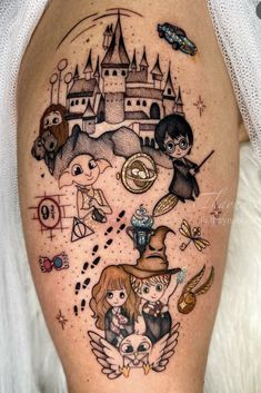 a woman's thigh with an image of harry potter and her friends on it