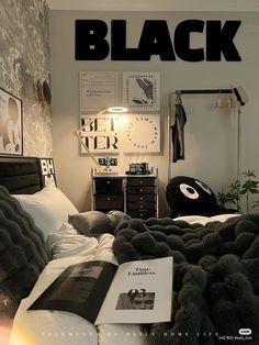 a bed room with a neatly made bed and a book on the side of it