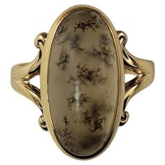 Vintage 14 Karat Yellow Gold Moss Agate Ring Size 4- This elegant ring features one moss agate - also known as picture agate - gemstone (14 mm x 8 mm) set in classic 14K yellow gold. Shank: 2 mm. Ring Size: 4 Weight: 1.6 dwt./2.6 gr. Stamped: 14K Very good condition, professionally polished. Will come packaged in a gift box or pouch (when possible) and will be shipped U.S. Priority Mail Insured. DV07082417KCS