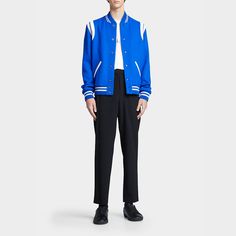 Saint Laurent "Teddy" wool-blend bomber jacket. Ribbed collar, cuffs, and hem. Baseball collar; snap front. Long sleeves. Front slash pockets. Virgin wool/nylon. Made in Italy. Blue Ribbed Collar Outerwear For Work, Varsity Jacket With Contrast Collar For Work, Collared Wool Outerwear With Ribbed Cuffs, Classic Workwear Outerwear With Striped Cuffs, Varsity Workwear Jacket With Pockets, Blue Wool Outerwear With Ribbed Collar, Varsity Jacket With Pockets For Workwear, Classic Outerwear With Baseball Collar For Work, Classic Baseball Collar Outerwear For Work